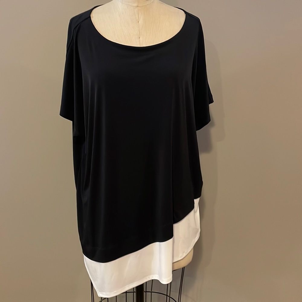Chico’s asymmetrical black and white short sleeve blouse